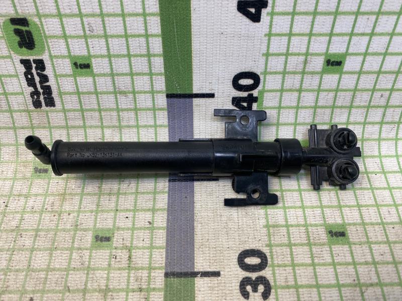 Форсунка омывателя фары левая Land Rover Range