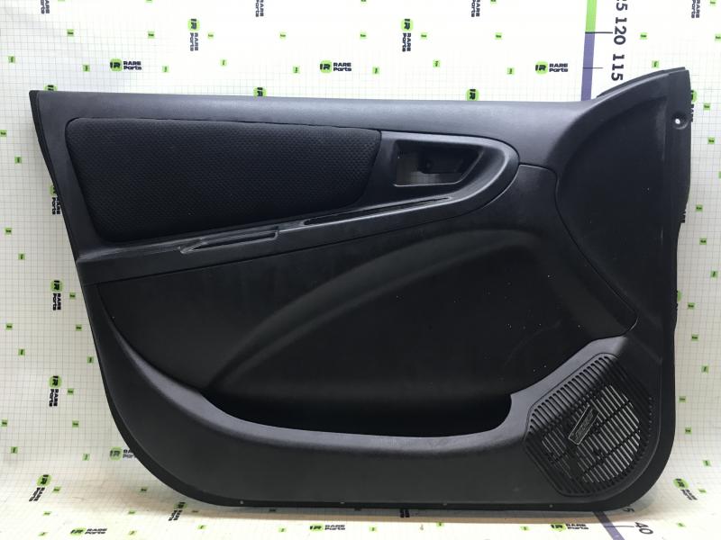 Обшивка двери передней левой Geely MK