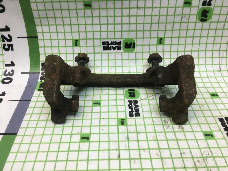 Скоба суппорта заднего Ford Focus