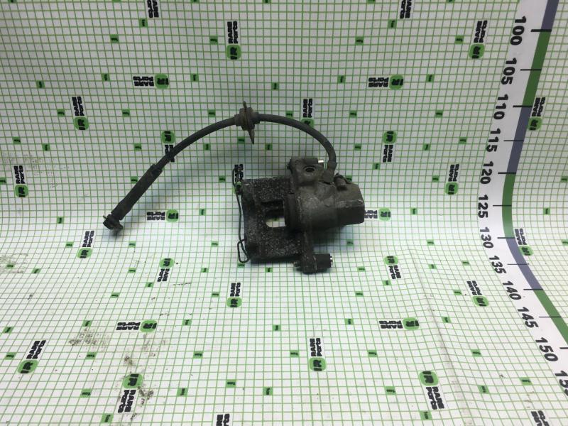 Суппорт тормозной задний правый Ford Focus