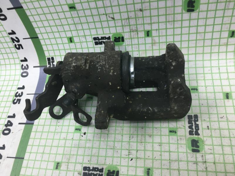 Суппорт тормозной задний Volkswagen Audi Skoda