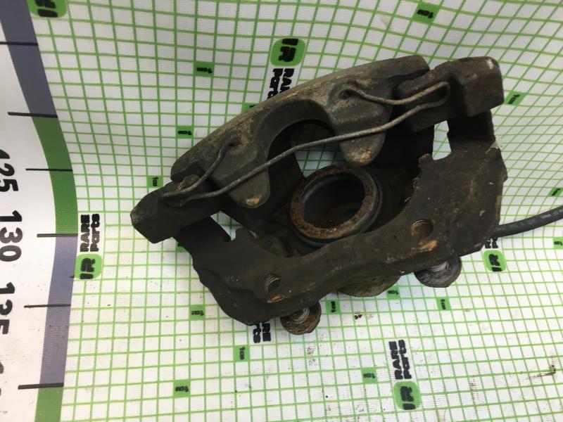 Суппорт тормозной передний левый Ford Focus Mazda3