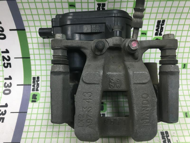 Суппорт тормозной задний левый Hyundai Palisade