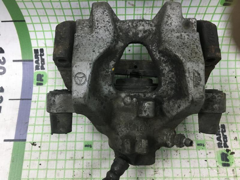 Суппорт тормозной задний левый Mercedes-Benz