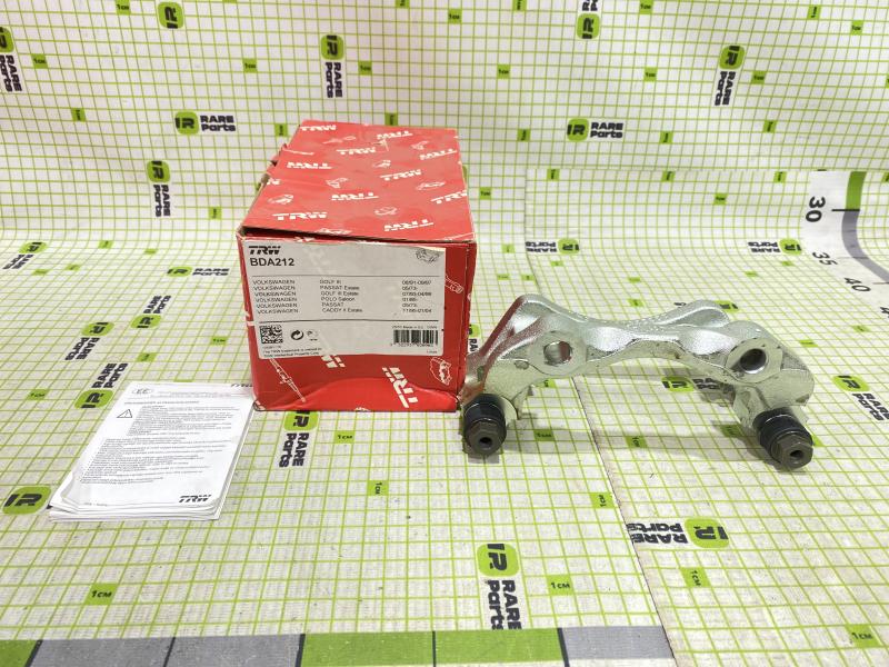 Скоба суппорта переднего для VW Golf IV